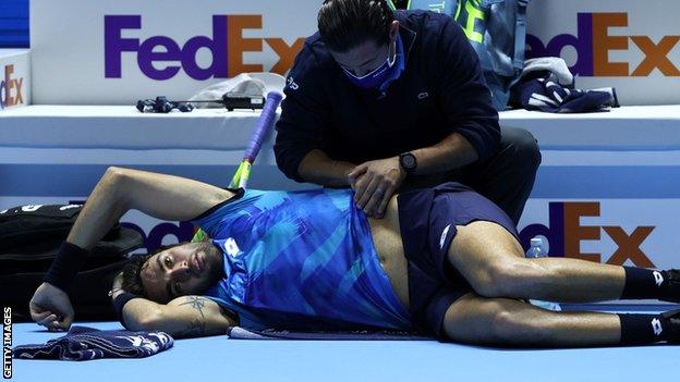 Matteo Berrettini receives treatment at the ATP Finals in Turin