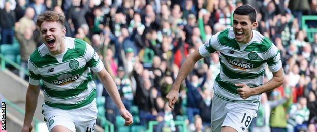 James Forrest (left) made it 3-0 to Celtic