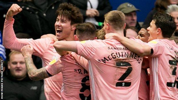 Rubin Colwill (left) celebrates his goal for Cardiff at QPR