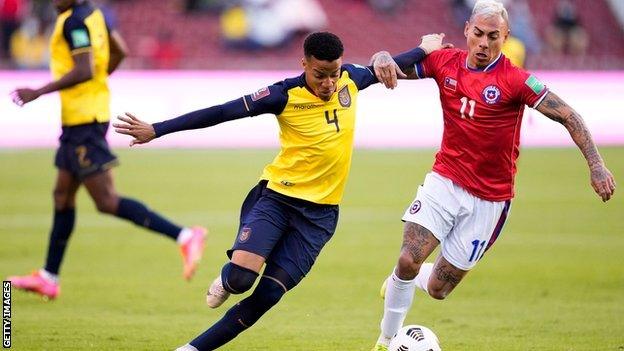 Ecuador's Byron Castillo and Chile's Eduardo Vargas