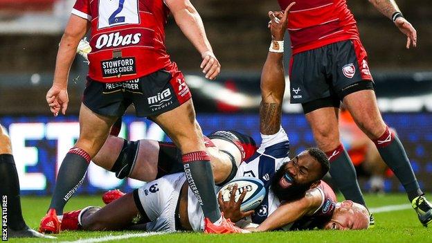 Semi Radradra celebrates scoring a try for Bristol Bears