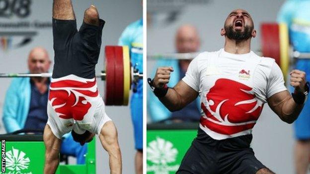 Ali Jawad celebrates a successful lift with a handstand