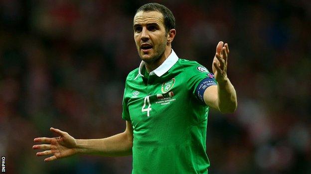 Republic of Ireland captain John O'Shea will be suspended for the first leg of the team's Euro 2016 play-off