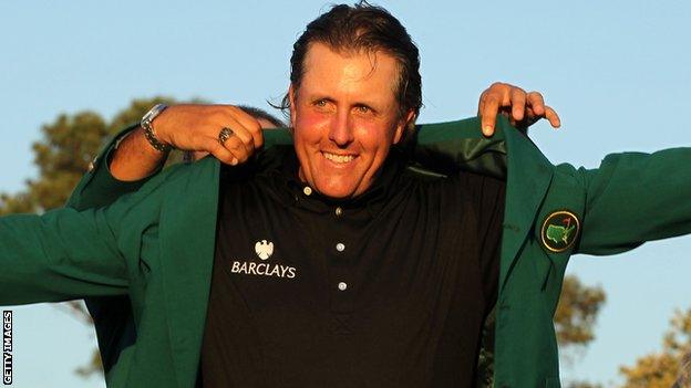 Phil Mickelson is presented with the Green Jacket after winning the 2020 Masters