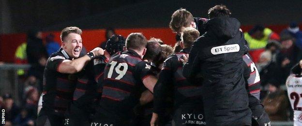 Edinburgh players celebrate Duncan Weir's match-winning drop-goal against Ulster