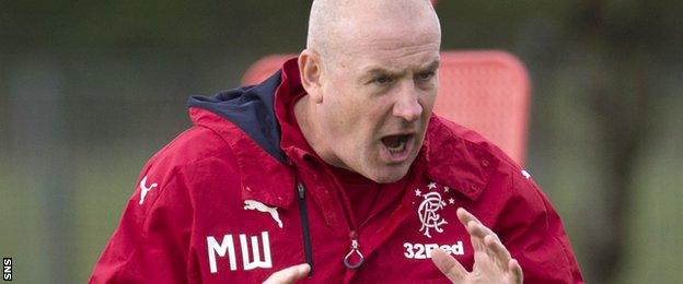 Rangers manager Mark Warburton oversees training on Wednesday