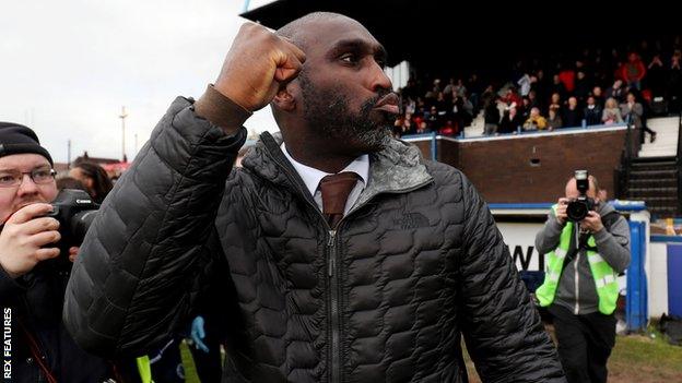 Sol Campbell celebrates after Macclesfield survived