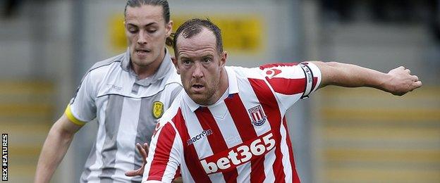 Burton Albion's Jackson Irvine and Stoke City's Charlie Adam