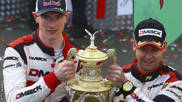 Elfyn Evans and Daniel Barritt with the trophy after winning the 2017n Wales Rally GB