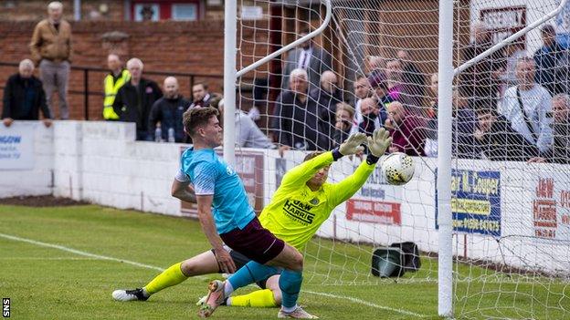 Fans watching Linlithgow v Hearts