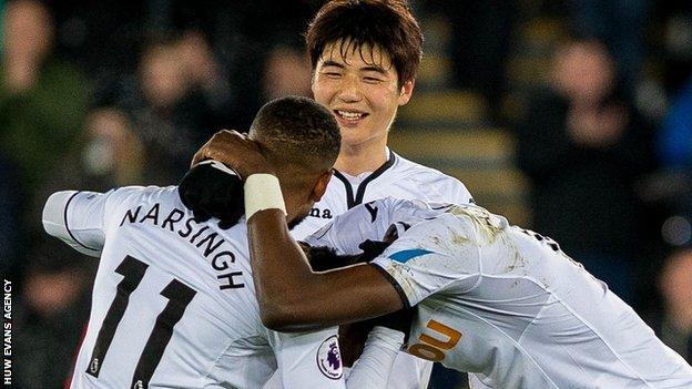 Swansea celebrate Wilfried Bony's winning goal against West Brom