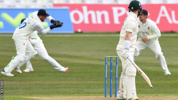 Durham wicketkeeper Stuart Poynter catches Nottinghamshire batsman Ben Duckett