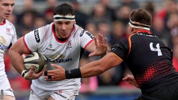 Ulster try-scorer Marcell Coetzee fends off Kings lock Andries Van Schalkwyk