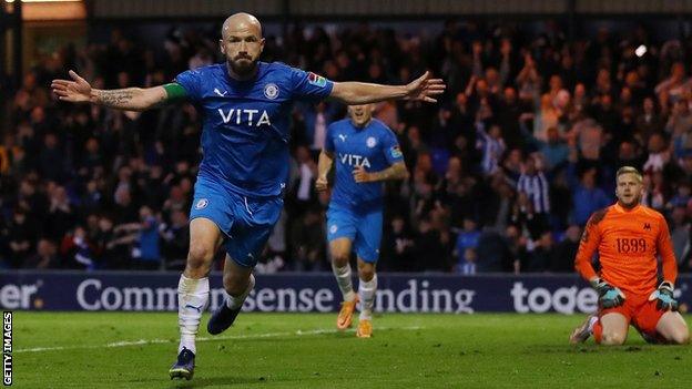 Paddy Madden celebrates his goal