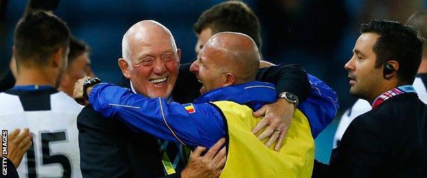 Coach Lynn Howells celebrates Romania's win over Canada in the 2015 World Cup