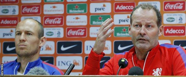 Arjen Robben (left) and coach Danny Blind face the media at Cardiff City Stadium