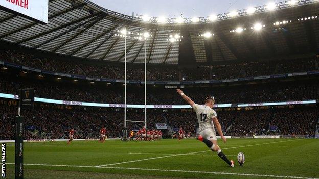 Owen Farrell kicks for goal agaisnt Wales at Twickenham