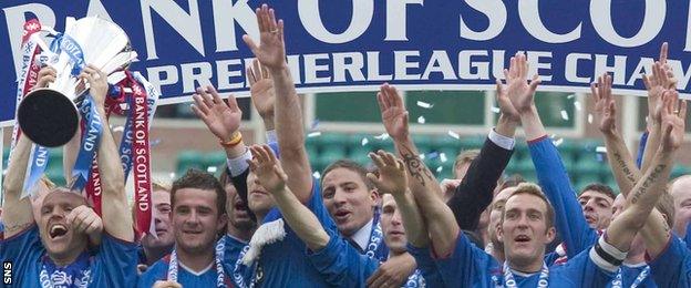 Rangers players celebrate winning the 2004-05 Scottish Premier League title