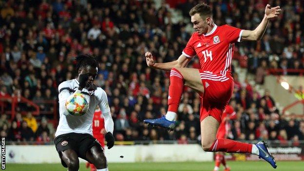 Ryan Hedges (right) in action for Wales