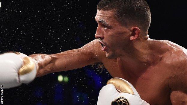 Spray flies as Lee Selby throws a punch during a title defence