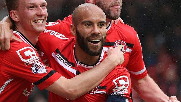 Adam Chambers celebrates Paul Downing's opening goal in last week's 3-1 win at home to Fleetwood