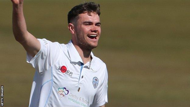 Derbyshire's Sam Conners celebrates taking a wicket