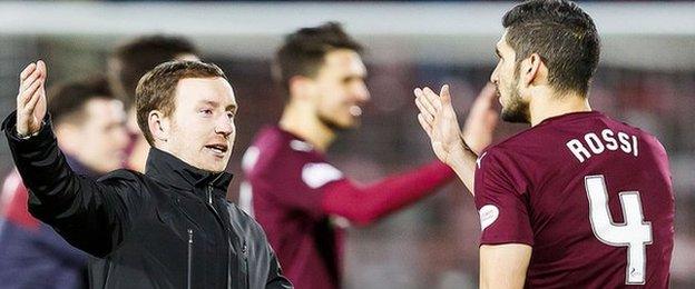 Hearts head coach Ian Cathro celebrates Tuesday's win over Kilmarnock with defender Igor Rossi