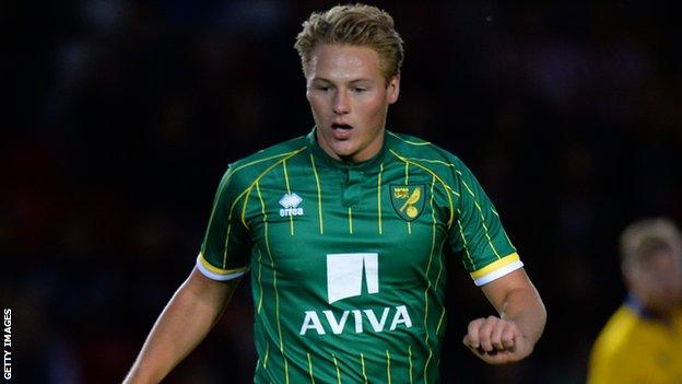 Cameron Norman in action for Norwich