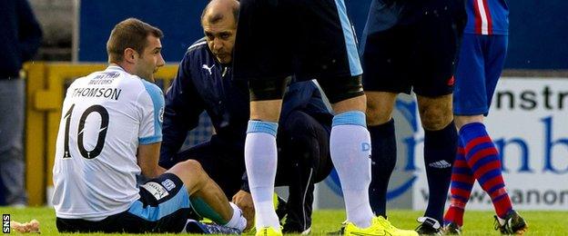 Kevin Thomson receives treatment for an injury while with Dundee