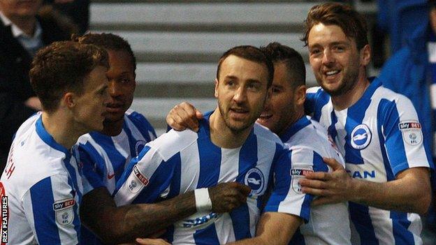 Glenn Murray celebrates his goal with teammates