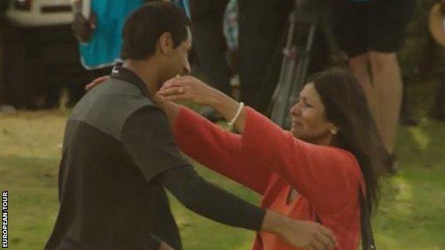 Aaron's mother greets him after winning the Kenya Open on her first trip back to the country in 47 years