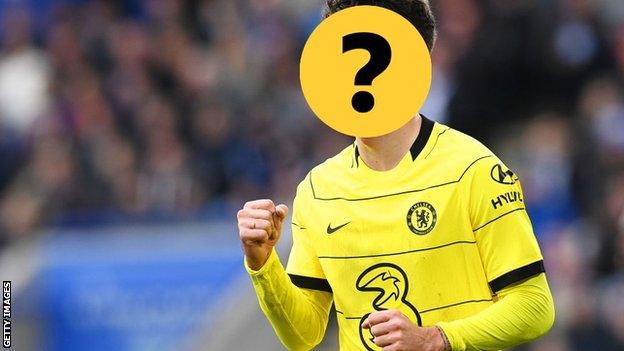 A Chelsea player with a question mark hiding his face