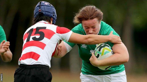 Ireland's Ailis Egan attempts to break through a tackle by Mayu Shimizu