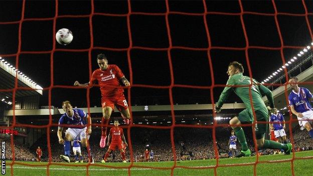 Liverpool striker Danny Ings scores against Carlisle