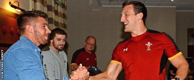 Rhys Webb presents Wales captain Sam Warburton with his match jersey for Fiji