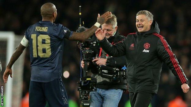 Ashley Young and Ole Gunnar Solskjaer shake hands