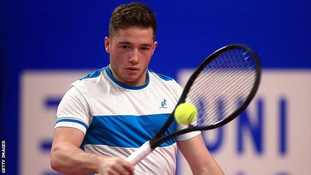 Alfie Hewett plays a backhand stroke at the NEC Wheelchair Tennis Masters event at Loughborough in December 2017