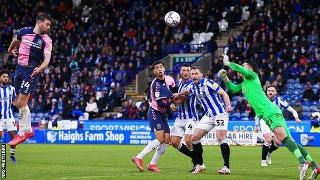 Matt Godden's eighth goal of the season won Coventry a point at Huddersfield