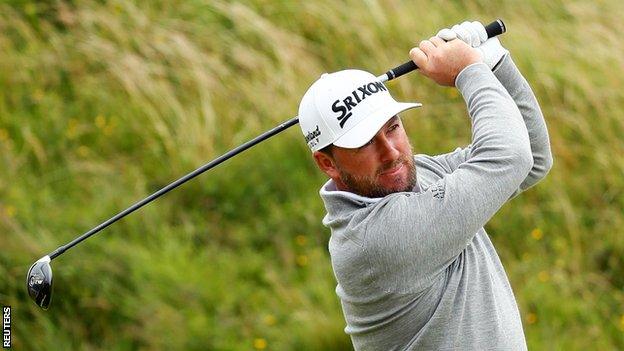 Graeme McDowell watches a shot during Wednesday's practice at royal Portrush