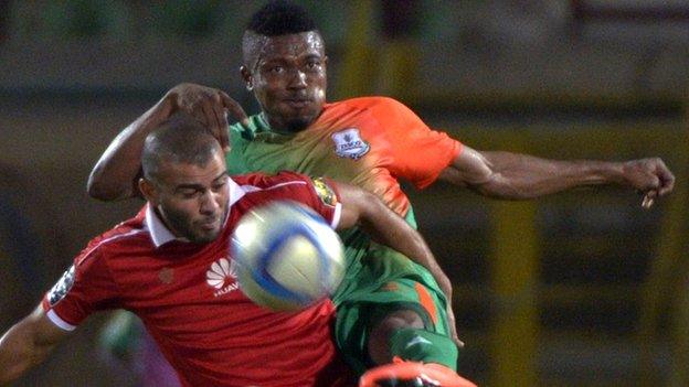 Zesco United defender Adama Ben Bahn (right) in action against Al Ahly