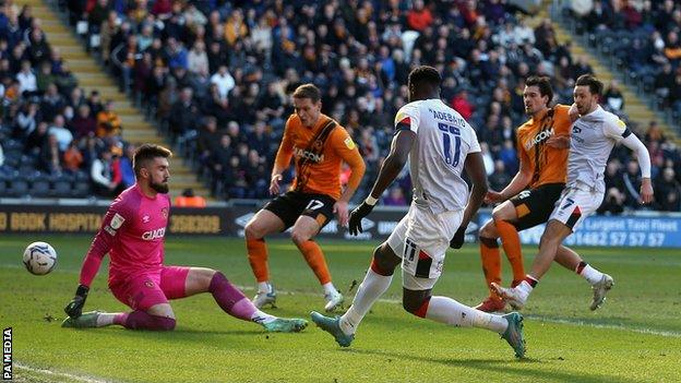 Elijah Adebayo scores Luton's opening goal