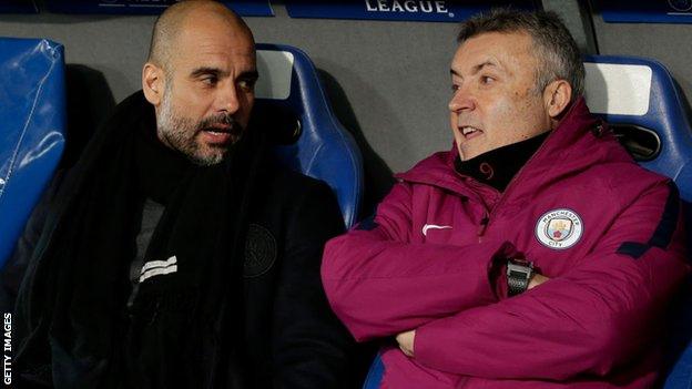 Manchester City's Pep Guardiola and Domenec Torrent