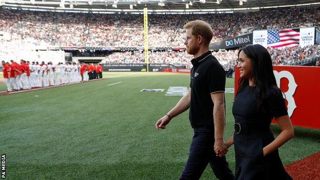 The Duke and Duchess of Sussex attend the Boston Red Sox vs New York Yankees baseball game at the London Stadium in support of the Invictus Games Foundation