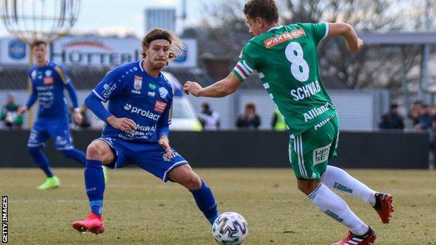 Austrian midfielder David Cancola, left, joins Ross County after a successful trial spell in January