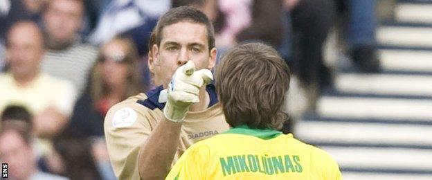 Craig Gordon and Saulius Mikoliunas