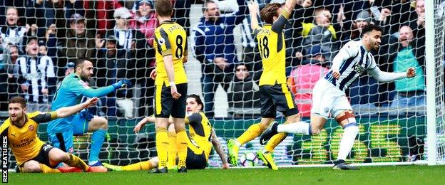 Hal Robson-Kanu (right) celebrates scoring