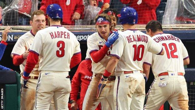 The Philadelphia Phillies celebrate Bryce Harper's home run