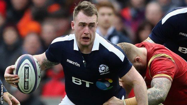 Stuart Hogg runs with the ball for Scotland against Wales