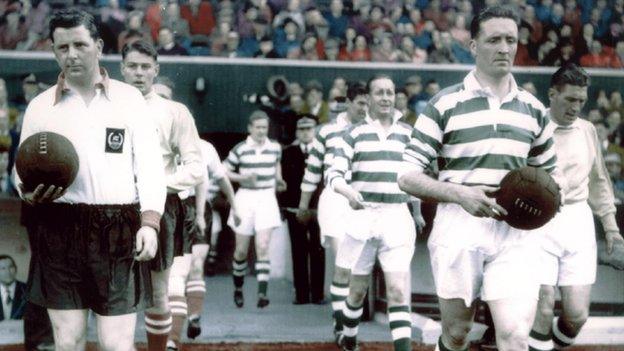 Jock Stein captaining Celtic against Clyde in 1955