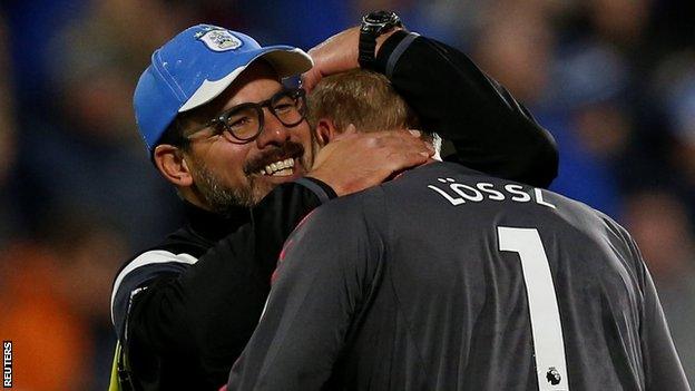 Huddersfield boss David Wagner celebrates with keeper Jonas Lossl